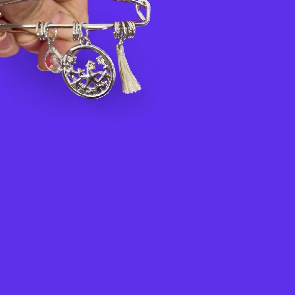 Silvertone bracelet with Silvertone and crystal charms